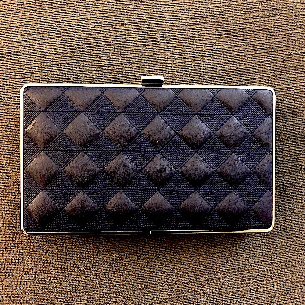 Sondra Roberts clutch dinner/wedding